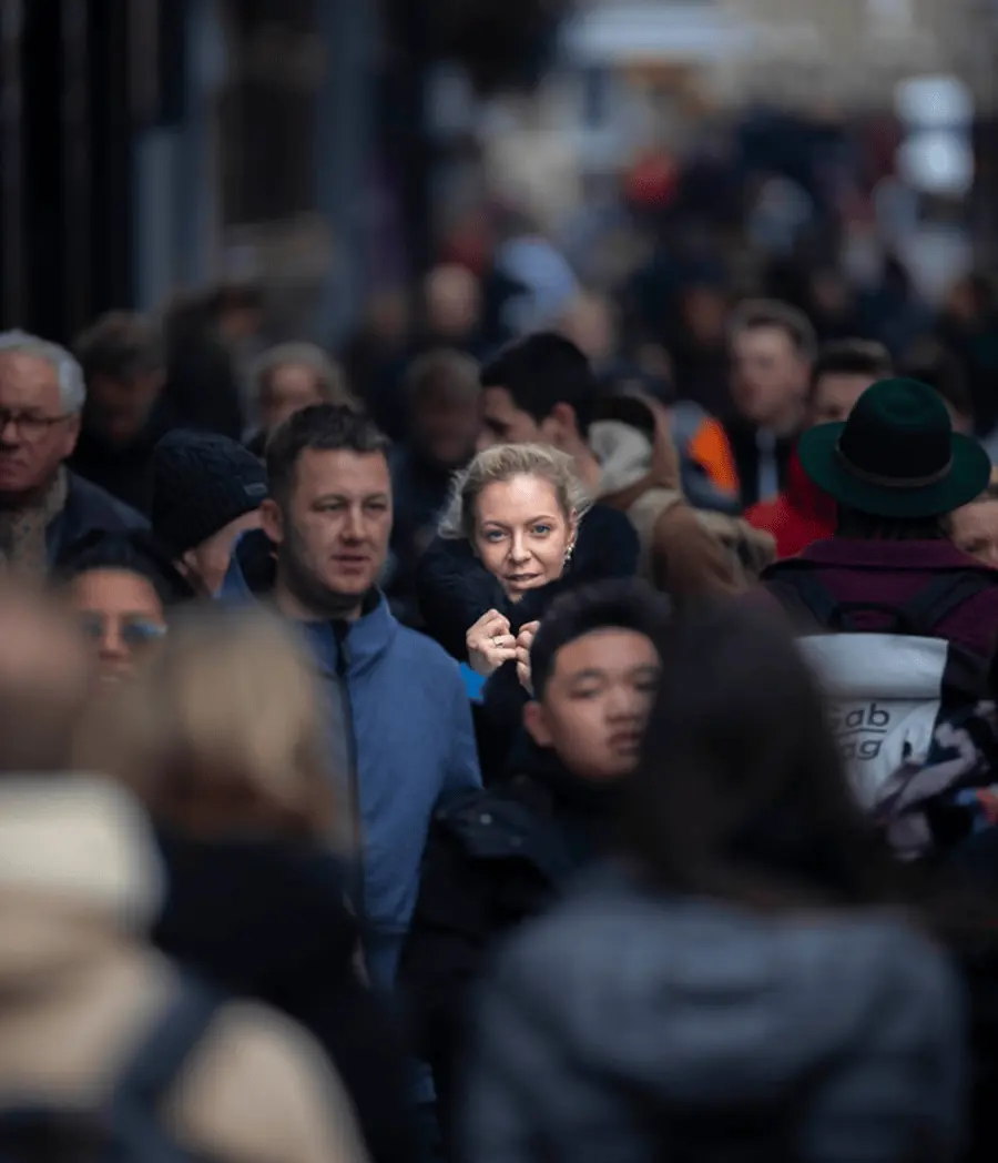 person walking among people